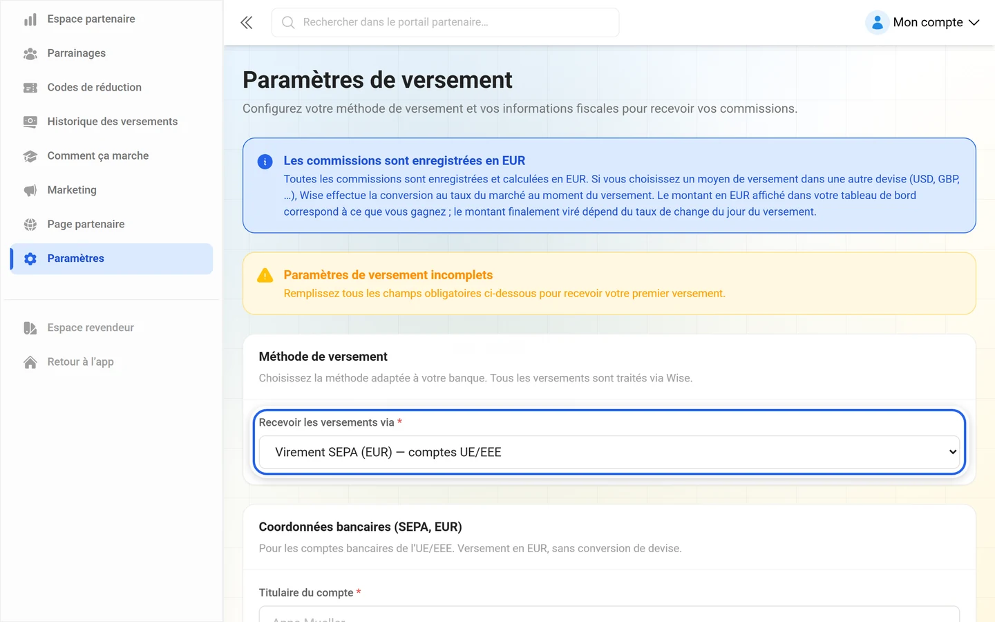 Paramètres de versement avec le sélecteur Recevoir les versements via mis en évidence, champs bancaires floutés