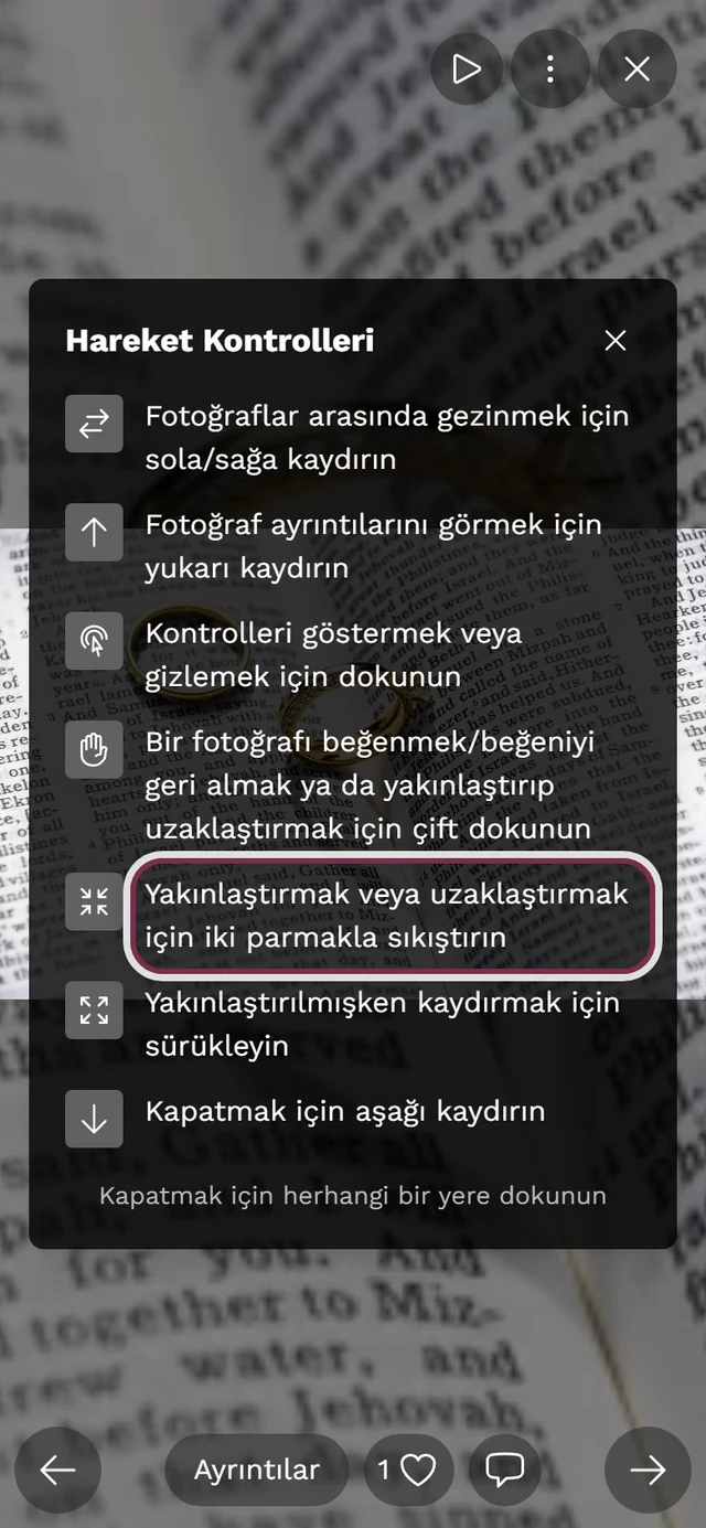 Tam ekranda gösterilen hareket kontrolleri, iki parmakla sıkıştırma satırı işaretli